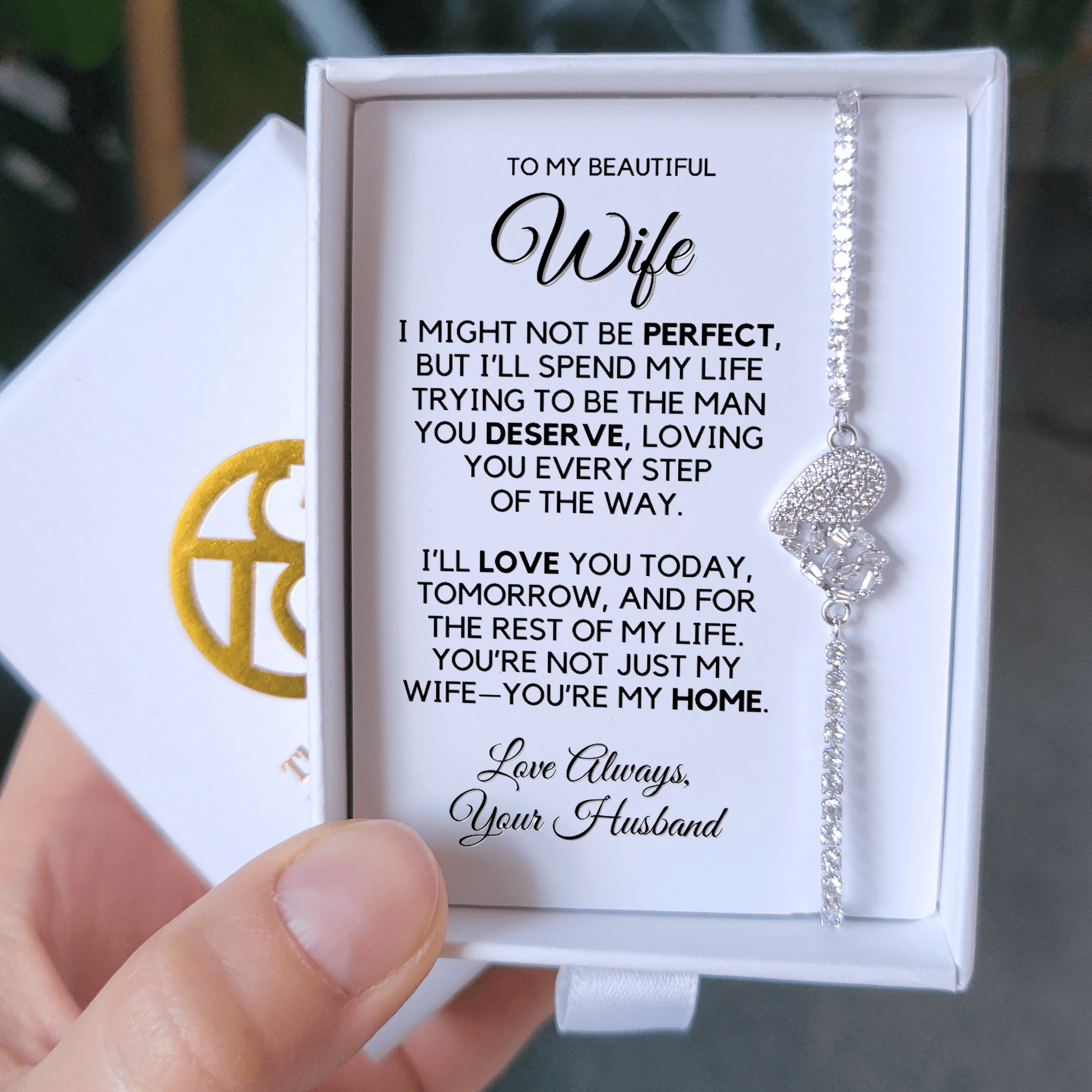 Photo of the Rhodium finish bracelet on the message card in the gift box