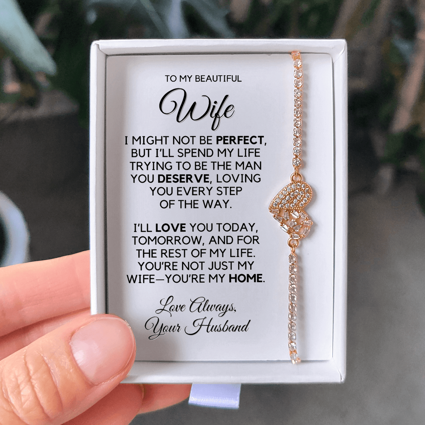 Photo of the 18K gold finish bracelet on the message card in the gift box