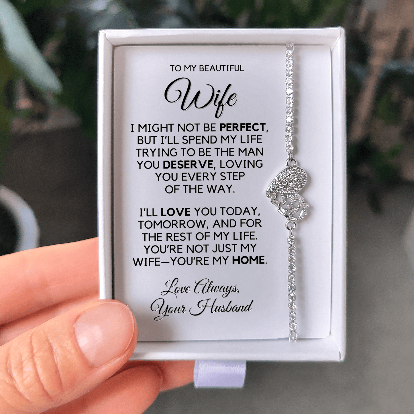 Photo of the Rhodium finish bracelet on the message card in the gift box
