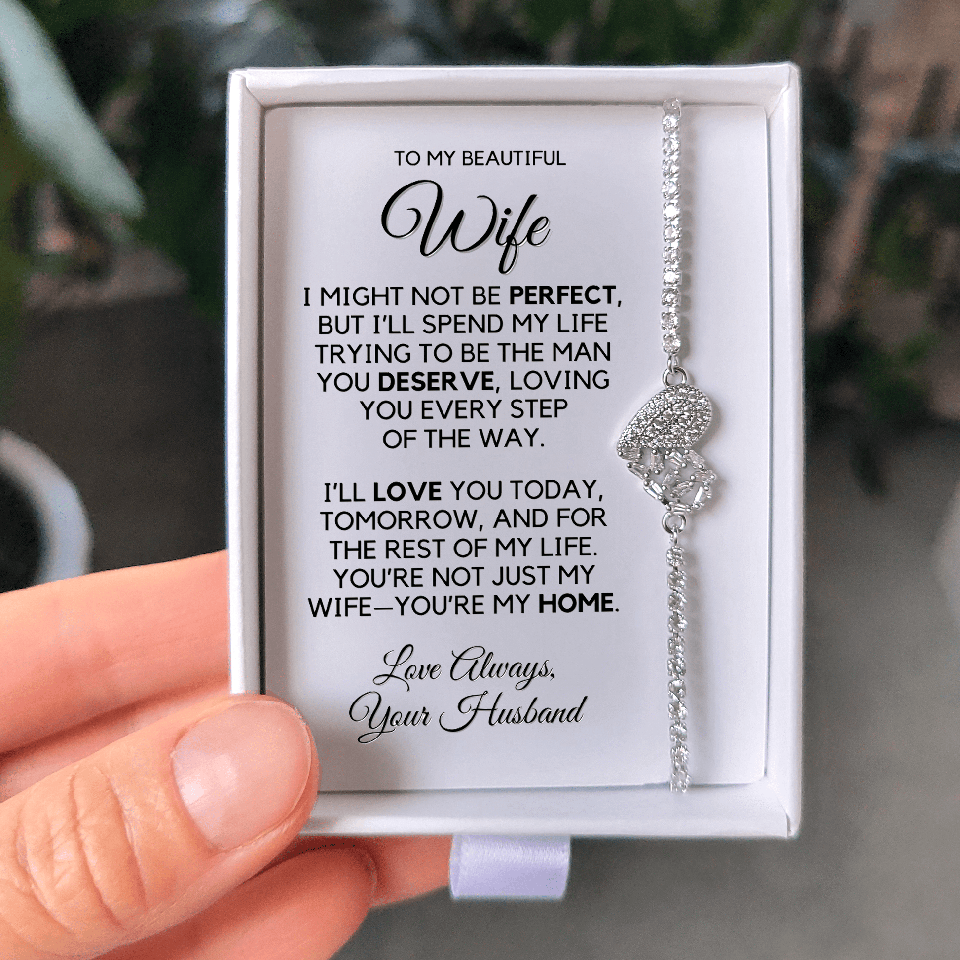 Photo of the Rhodium finish bracelet on the message card in the gift box