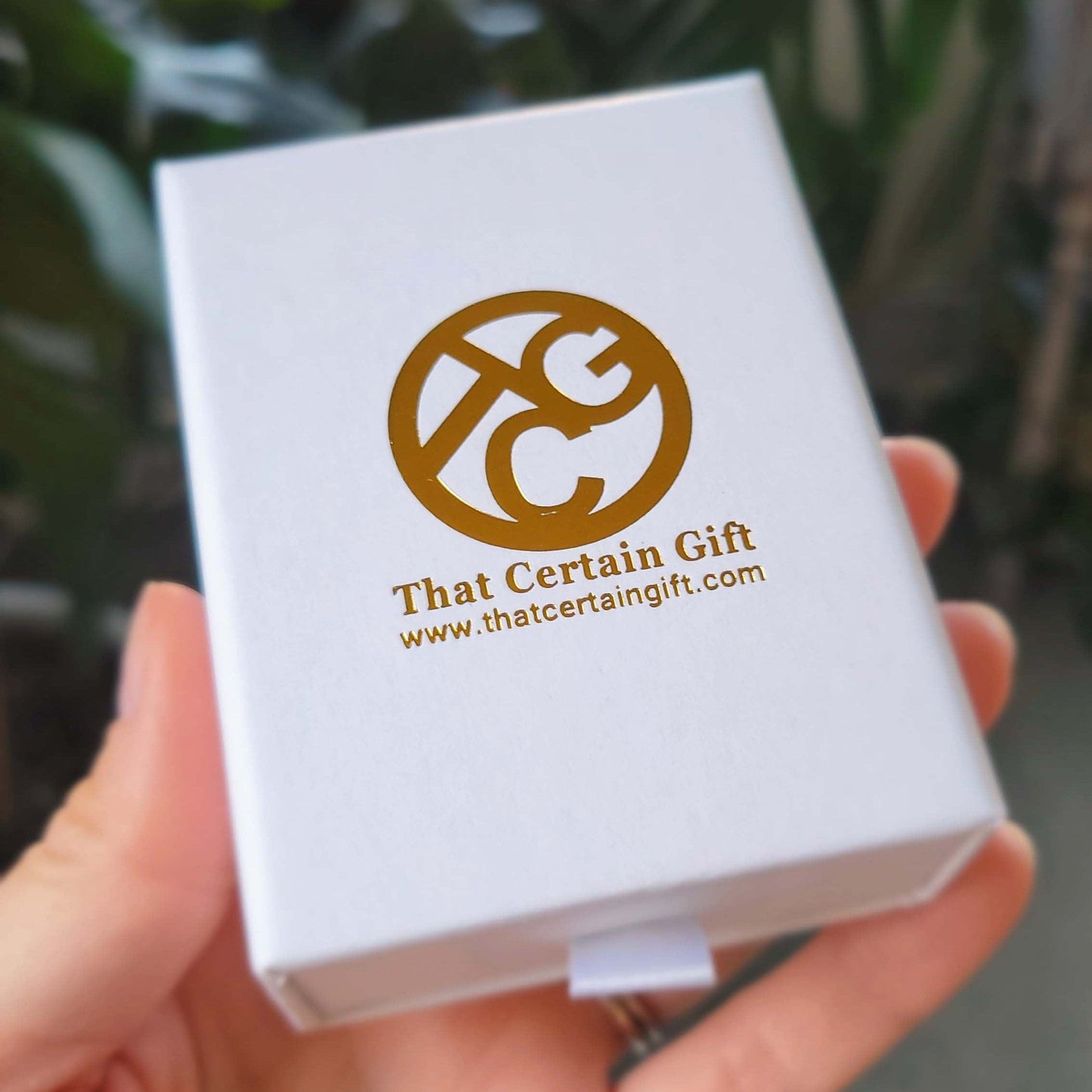 box that the bracelet comes in. it is a drawer style box. It is white with a gold company logo